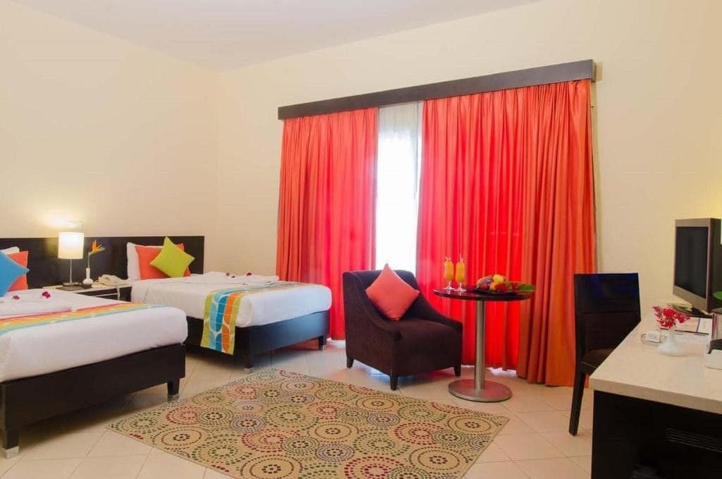 فندق Hotel Tida Swiss An